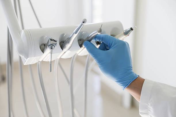 Professional Tooth Extraction technician working in Garland, UT